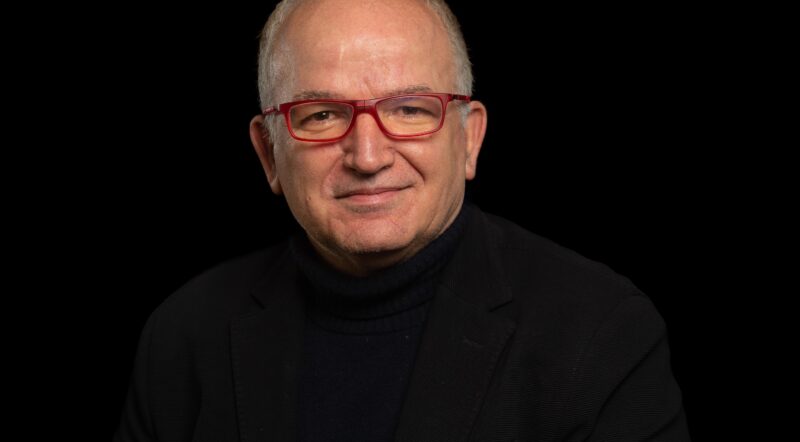Prof.